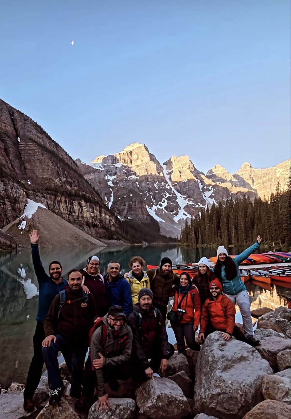 A RockFlower group at Moraine Lake as the Ten Peaks catch first light